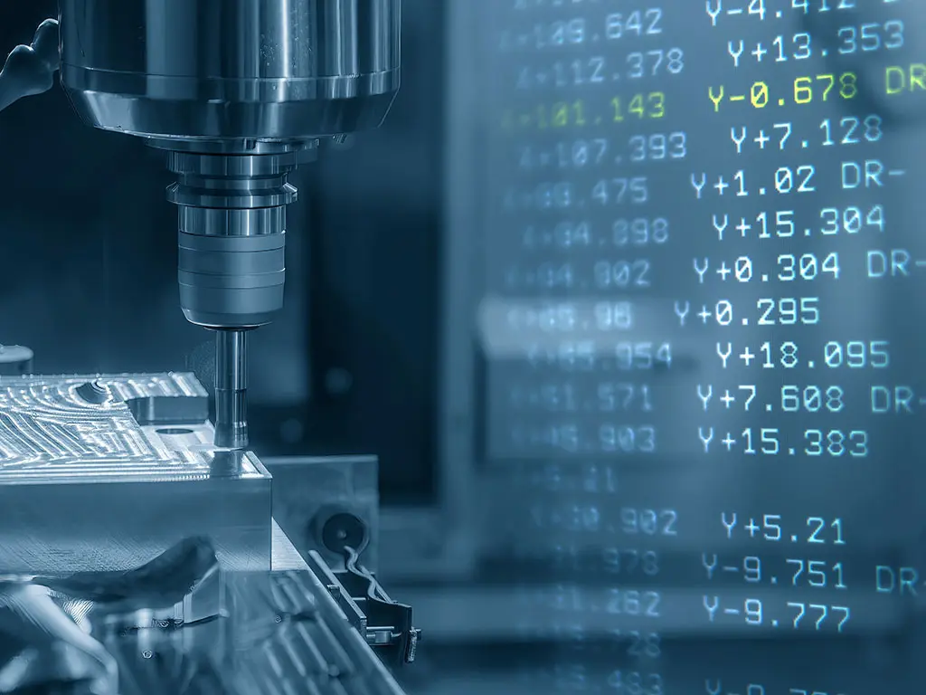 Decimo Production: Precision CNC Machining. Detail of a CNC machine in operation in Decimo's production department.