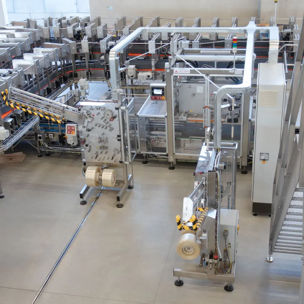 Impianto di manigliatura con manigliatrice elettronica XHE presso lo stabilimento di Valmora.